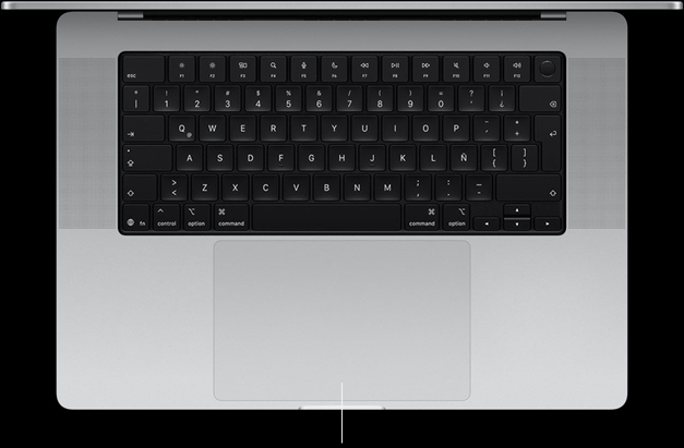 Vista desde arriba de un MacBook Pro de 16 pulgadas que muestra el trackpad Force Touch debajo del teclado