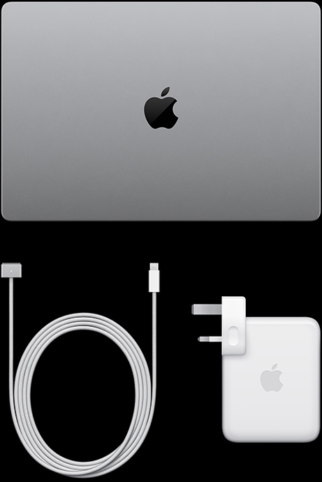 配備 PROLED XDR 顯示器的銀色 MacBook Pro 的俯視圖，呈合上狀態；USB-C 充電線和電源轉換器