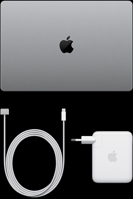 MacBook Pro dengan Layar PROLED XDR, warna perak, tampak atas, tertutup, kabel pengisi daya USB-C dan adaptor daya