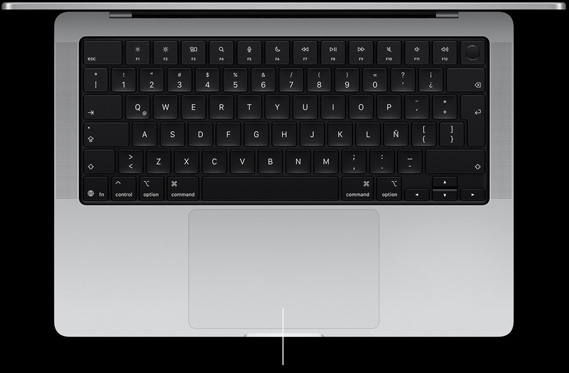 MacBook Pro, color plata, abierta, se muestra el teclado y el trackpad Force&nbsp;Touch