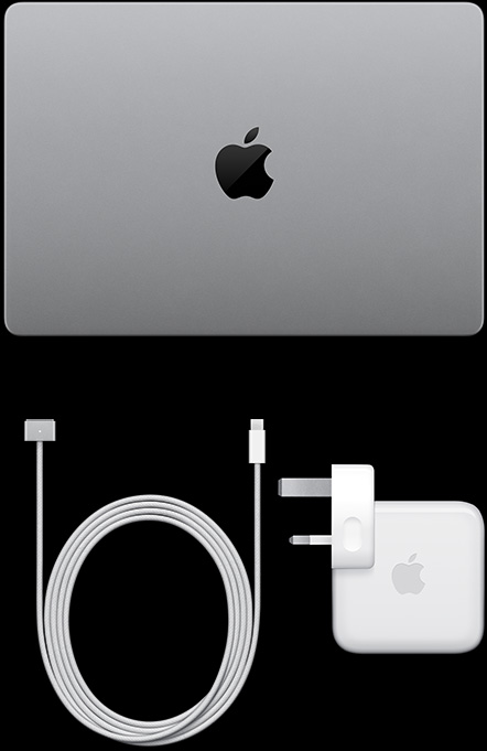 MacBook Pro with PROLED XDR Display, silver color, top, closed, USB-C charging cable and power adapter
