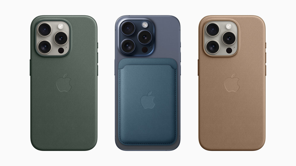 The new FineWoven Case with MagSafe on three iPhone 15 Pro devices and the FineWoven Wallet with MagSafe on one.