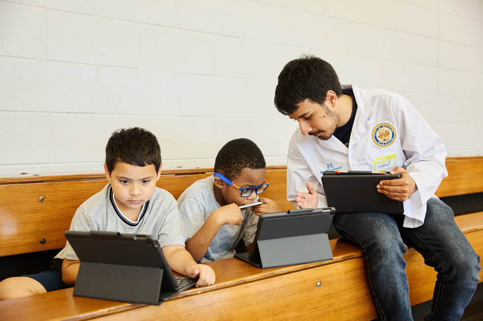 Students use iPad and Apple Pencil with their instructor at TechConnect.