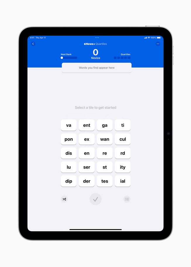 The spelling game Quartiles is shown on an iPad (10th generation).