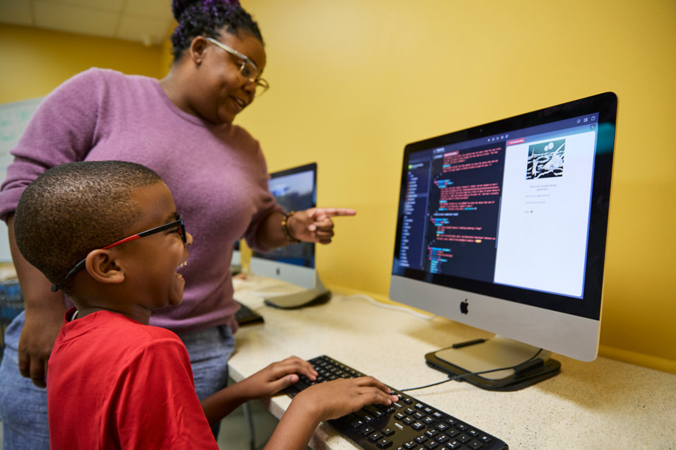 Ellis Marsalis Center for Music participant Jahaad Applebee works in Swift with his teacher LaTasha Bundy in the Mac lab at the center.