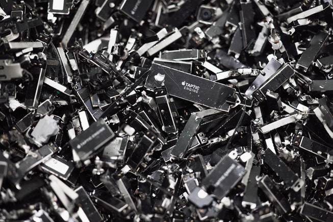 Apple Taptic Engine materials being recycled.