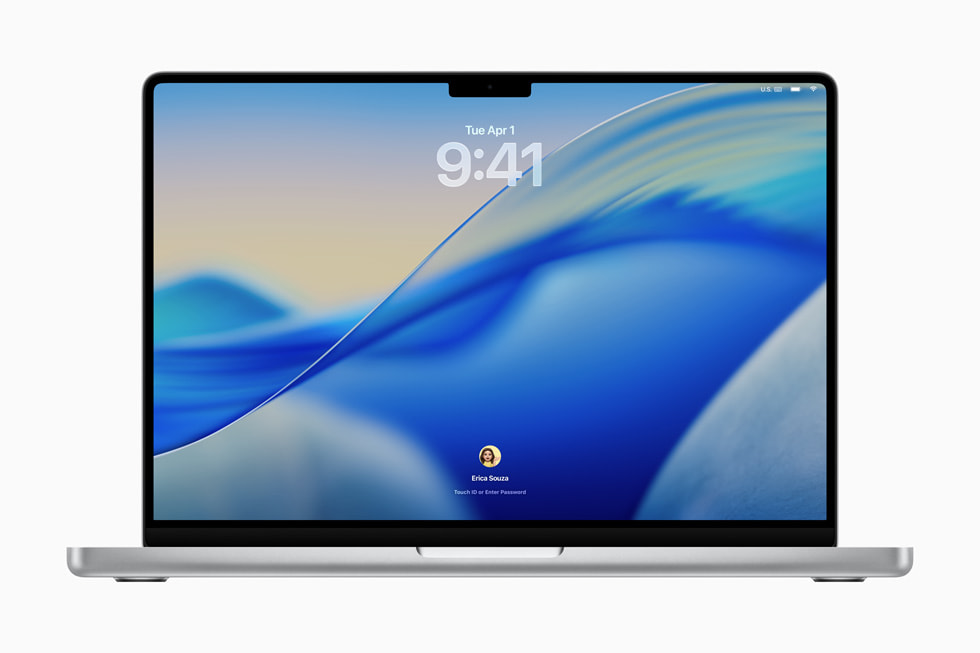 Una MacBook Pro de 16 pulgadas muestra la pantalla bloqueada con el nuevo diseño en macOS Tahoe.