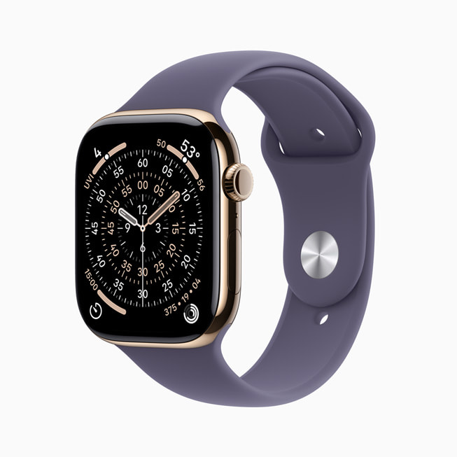Apple Watch Series 11 vist i titanium i farven guld.