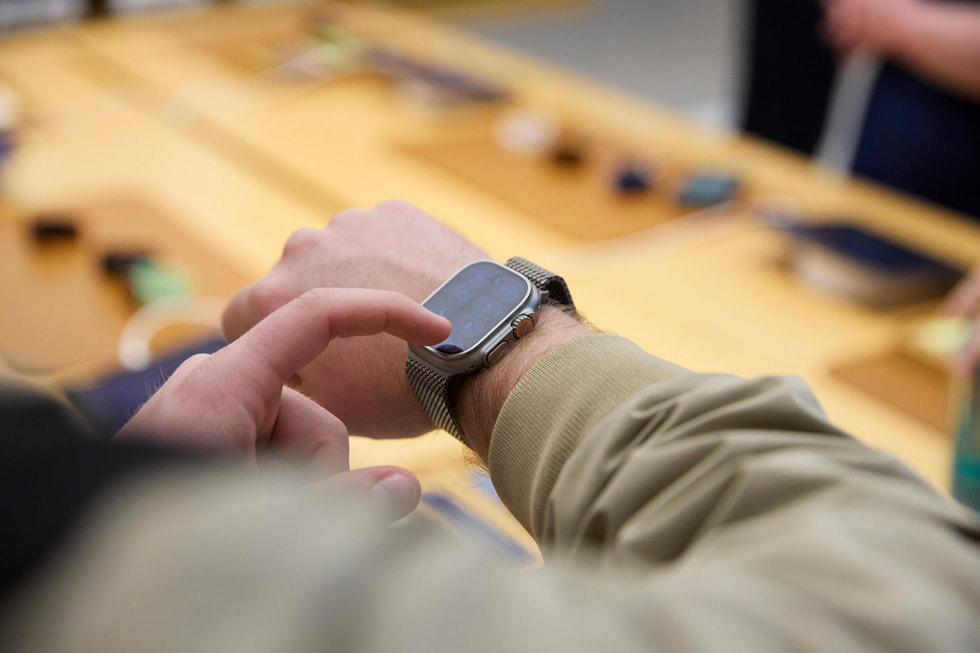 A customer tries on Apple Watch Ultra 3 at Apple Sydney in Australia.