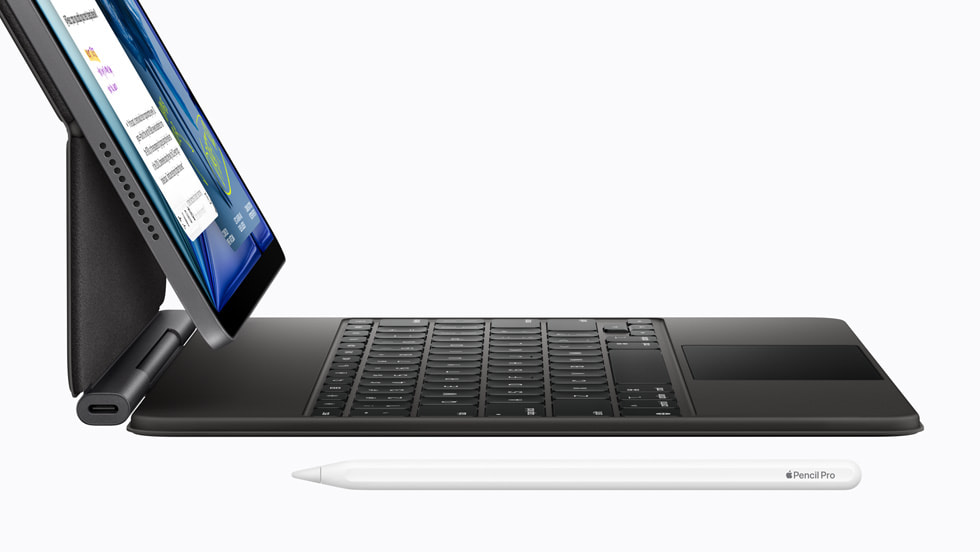 A side view of iPad Air with M4 with Magic Keyboard and Apple Pencil Pro.