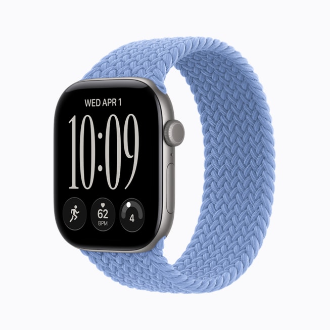 Apple Watch Series 12 in space grey aluminium with a wildflower blue Braided Solo Loop band.