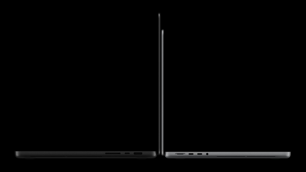 Two MacBook Pro with PROLED XDR Display devices are shown back to back from the side with the screen open.