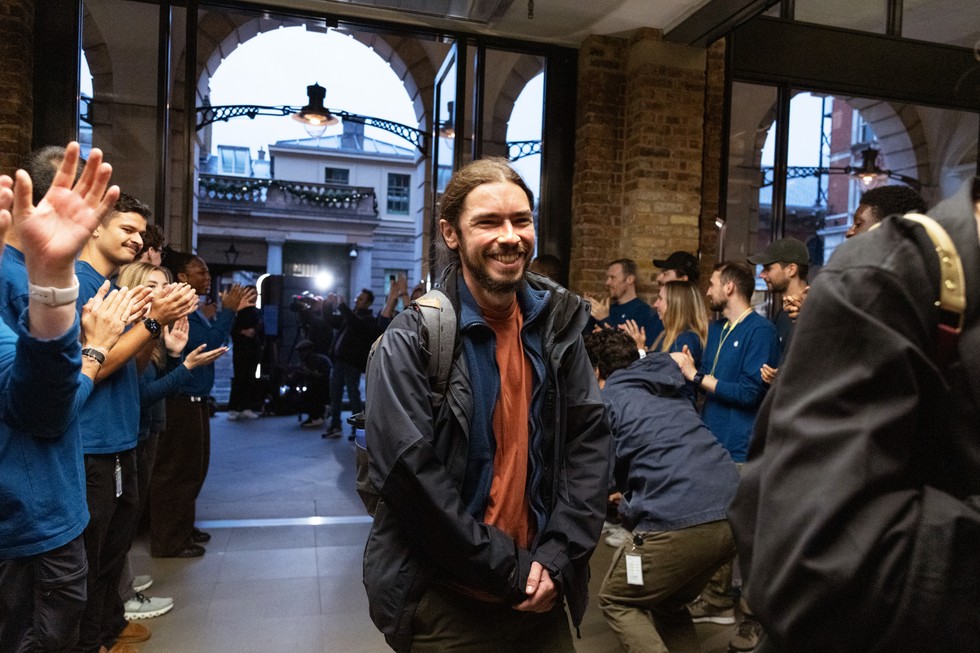 At Apple Covent Garden, Apple team members greet incoming customers.
