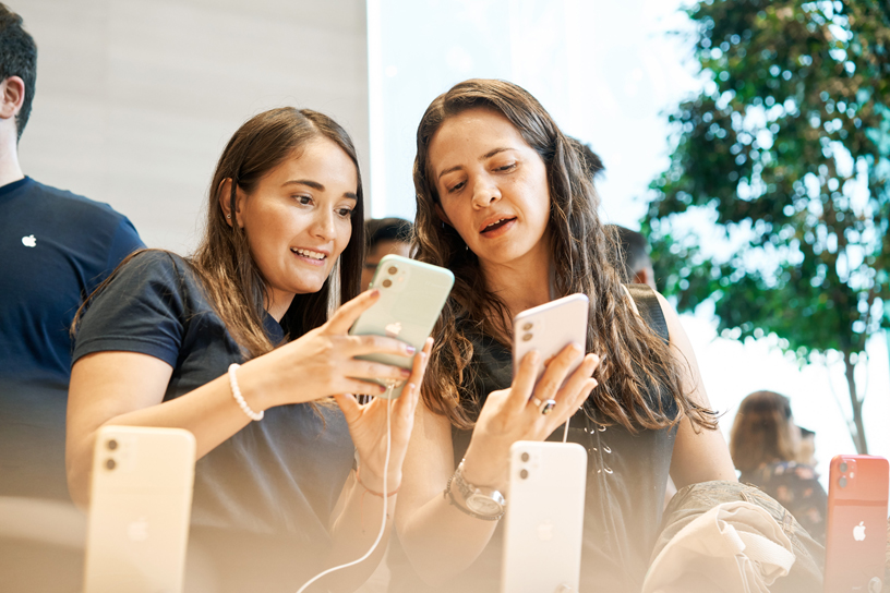 Customers try out iPhone 11 at Apple Antara.