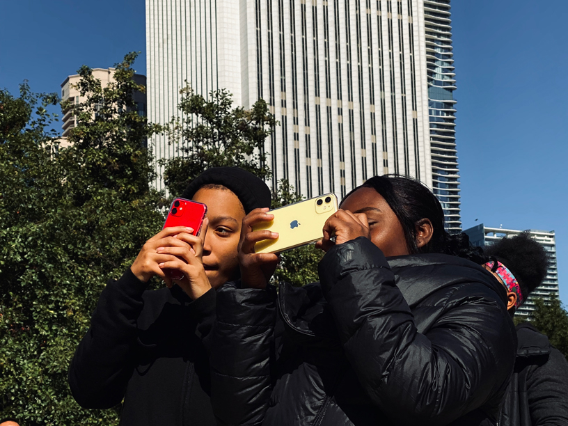 DRW College Prep students with iPhone 11.