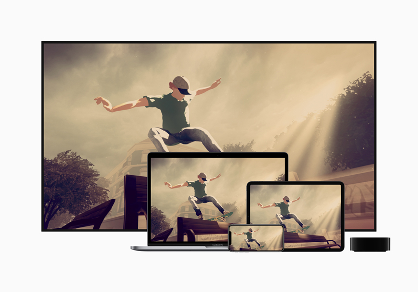 TV, Mac, iPad and iPhone next to Apple TV displaying “Skate City.”