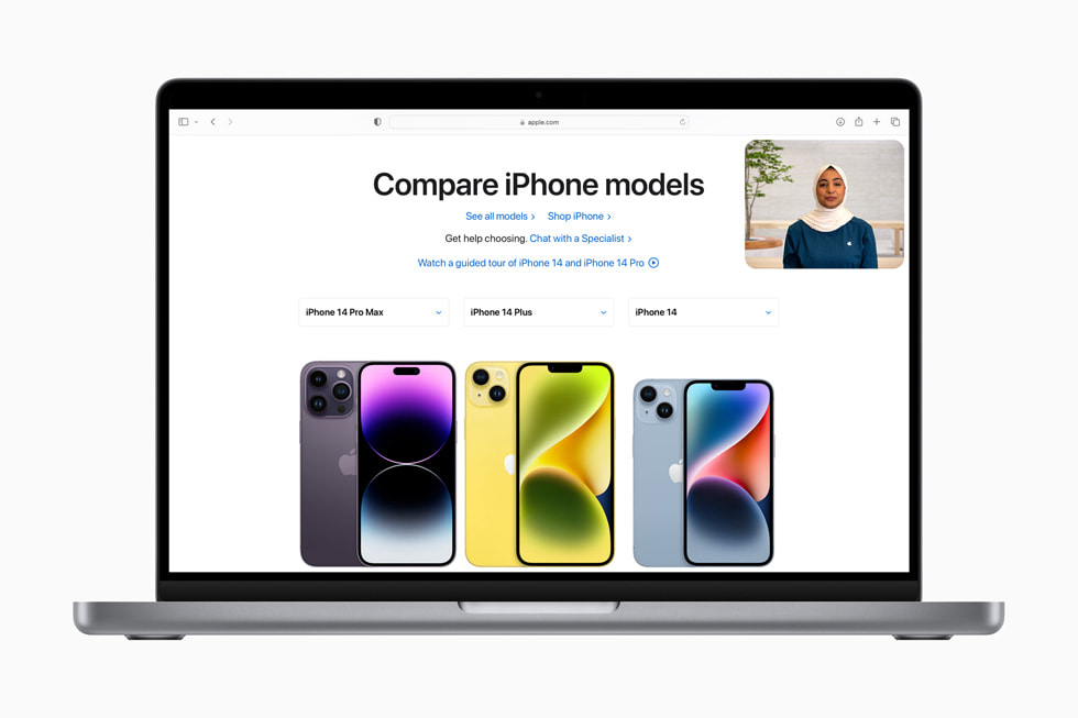 The Shop with a Specialist over Video experience is shown over an [apple.com] (https://applews.rehcb.com) page reading “Compare iPhone models” and showing iPhone 14 Pro Max, iPhone 14 Plus, and iPhone 14.