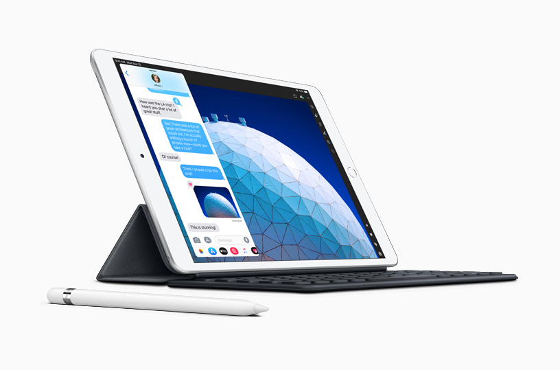 iPad Air with Apple Pencil, displaying Slide Over screen of iMessages.