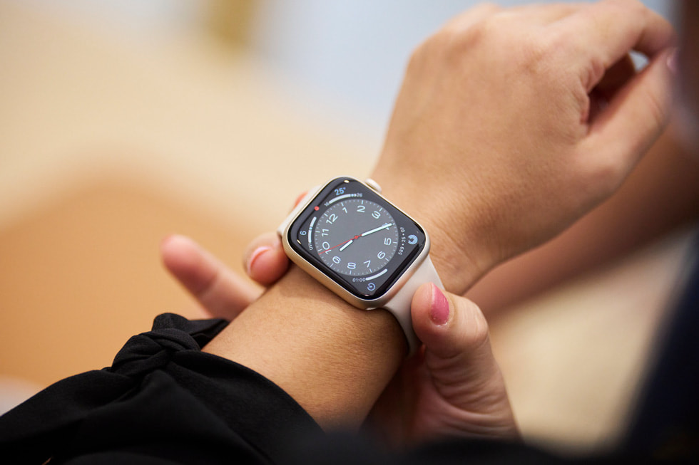 An Apple Orchard Road customer trying on Apple Watch. 