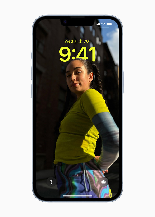The reimagined Lock Screen in iOS 16 is shown.