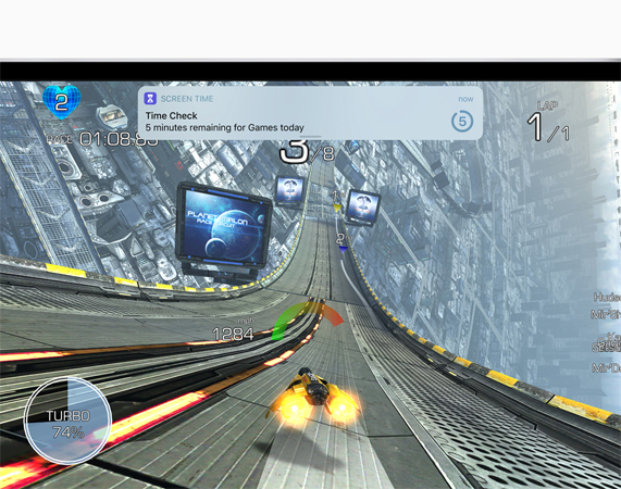 iPad showing mid-game screen shot with a 5 minute time check Screen Time notification banner.