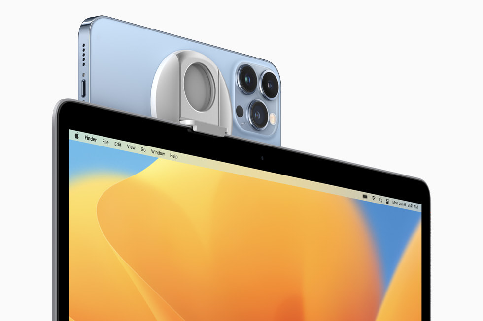 iPhone 13 Pro being used as a webcam with Continuity Camera on the new 13-inch MacBook Pro.