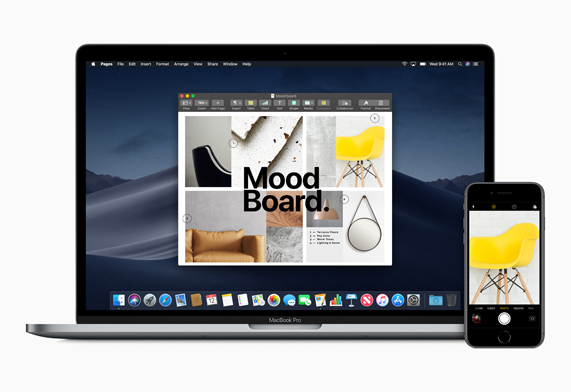 MacBook Pro with Keynote showing a photo of a yellow chair taken with an iPhone 8, next to it.