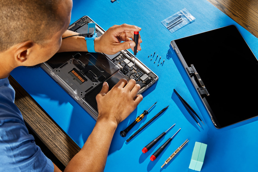 Self Service Repair being done on MacBook.