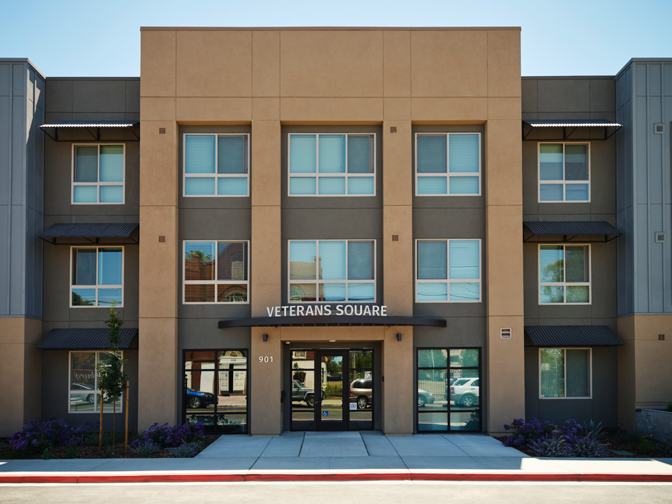 The exterior of the three-story Veterans Square housing complex in Pittsburg, California, is shown.
