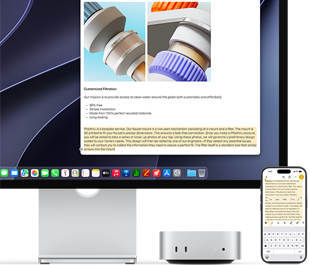 Mac mini frontal, așezat sub Studio Display, un iPhone se află în dreapta dispozitivului și a ecranului, textul selectat cu comenzile tăiere, copiere, lipire și Auto-completare afișate deasupra pe iPhone corespunde textului evidențiat de pe ecran, prezentând Clipboard universal