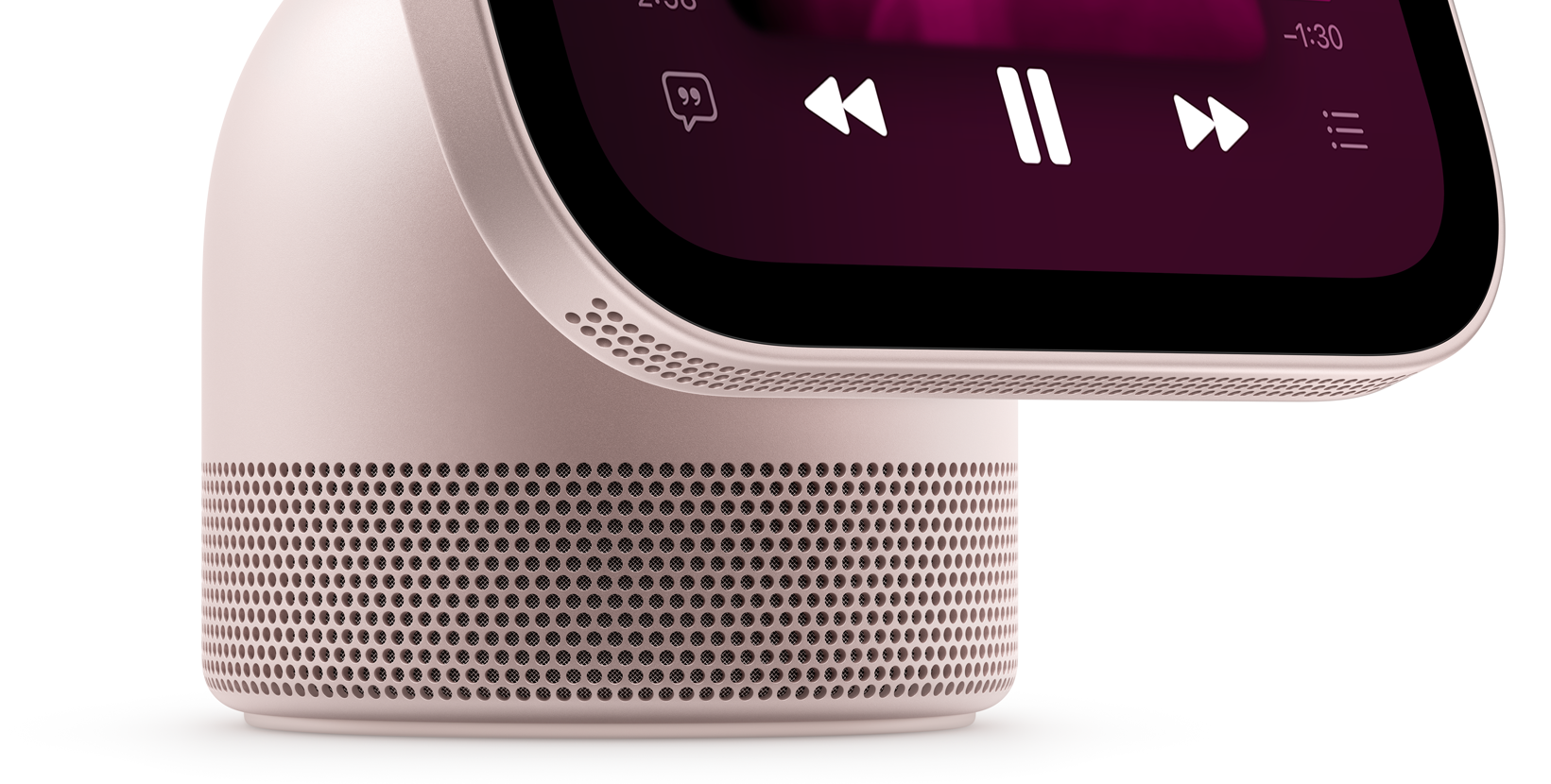 Apple HomeView, rose pink colour, close-up view of the perforated speaker grille surrounding the base and along the bottom of the display, screen shows Music app with playback controls
