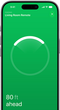 iPhone, das Display zeigt die „Wo ist?“ App, der Text lautet „Fernbedienung Wohnzimmer suchen“, kreisförmiger Ortungsring mit hellem Bogen, der in Richtung der Fernbedienung zeigt, Text „24 m vor dir“