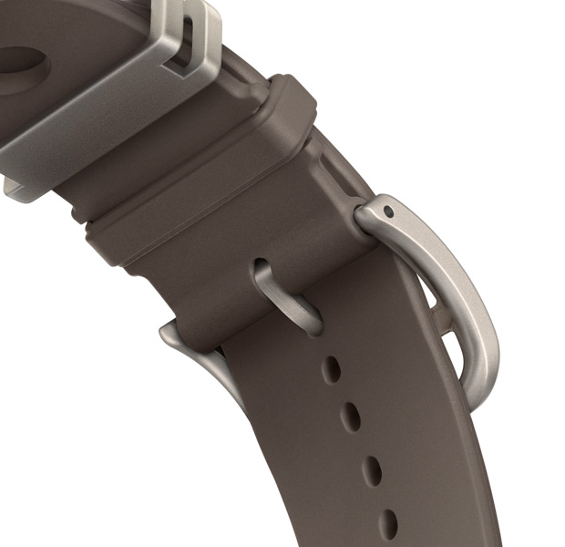 Apple Watch Hermès Ultra 4 med Scub'H Diving-armband i färgen Gris Titane (grå), undersidan av spännet, mjukt formgjutet gummi med runda hål