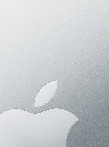 Logo blanco de Apple sobre un fondo plateado que hace referencia a la tapa de una MacBook Air