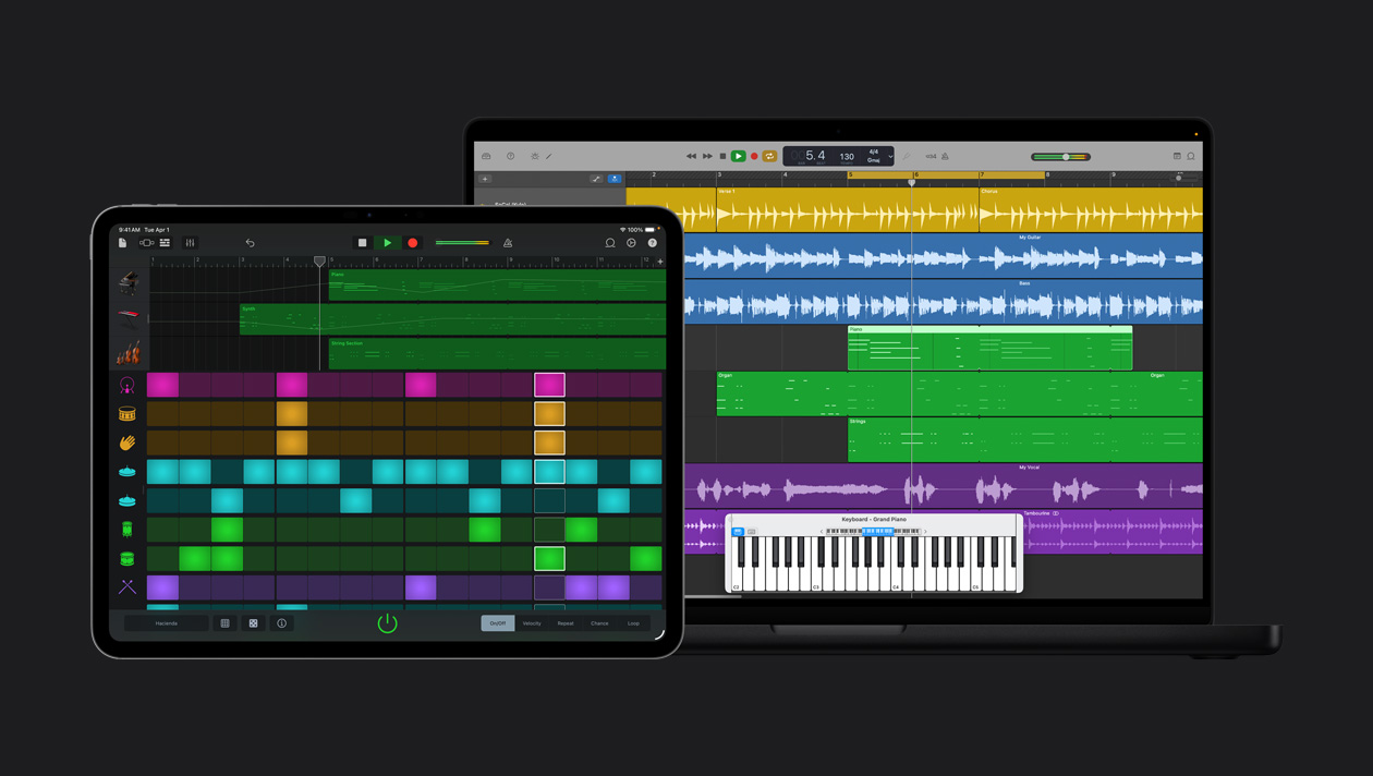 Layar iPad Pro 13 menampilkan ruang kerja dengan panel instrumen di sebelah kiri dan warna serta gelombang audio yang sesuai di sebelahnya, layar MacBook Pro 16 menampilkan baris untuk berbagai instrumen dengan gelombang suara warna berbeda, keyboard grand piano di bagian bawah