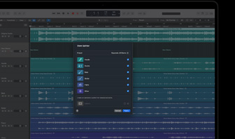 جهاز MacBook Pro، برنامج Logic Pro، مسارات موجية، لوحة Stem Splitter، الفئات: أصوات، طبول، باس، غير ذلك، كل منها مع موجة صوتية منفصلة