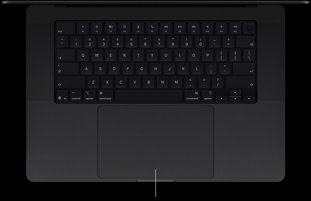 MacBook Pro avec Écran PROLED XDR, noir sidéral, ouvert, montrant le clavier et le trackpad Force Touch