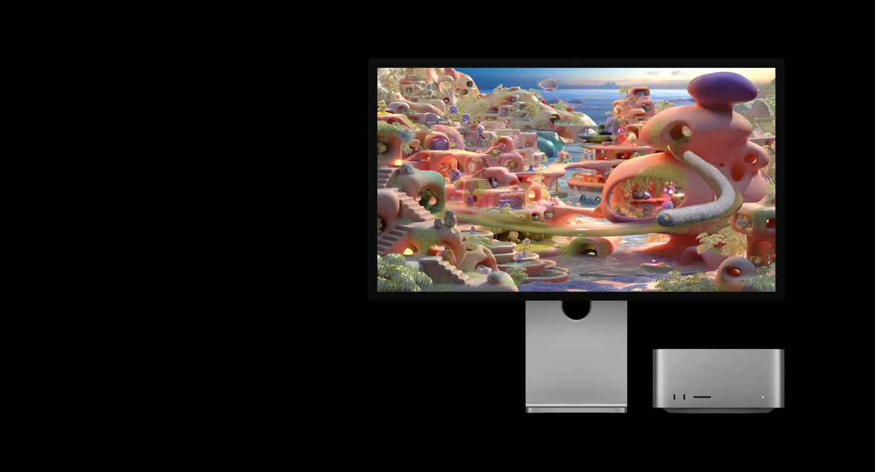 Dans un paysage de dessin animé s’affichant sur un Studio Display XDR avec un Mac Studio glissé en dessous, une créature ressemblant à un ver sort d’un tunnel et se déplace sur l’écran