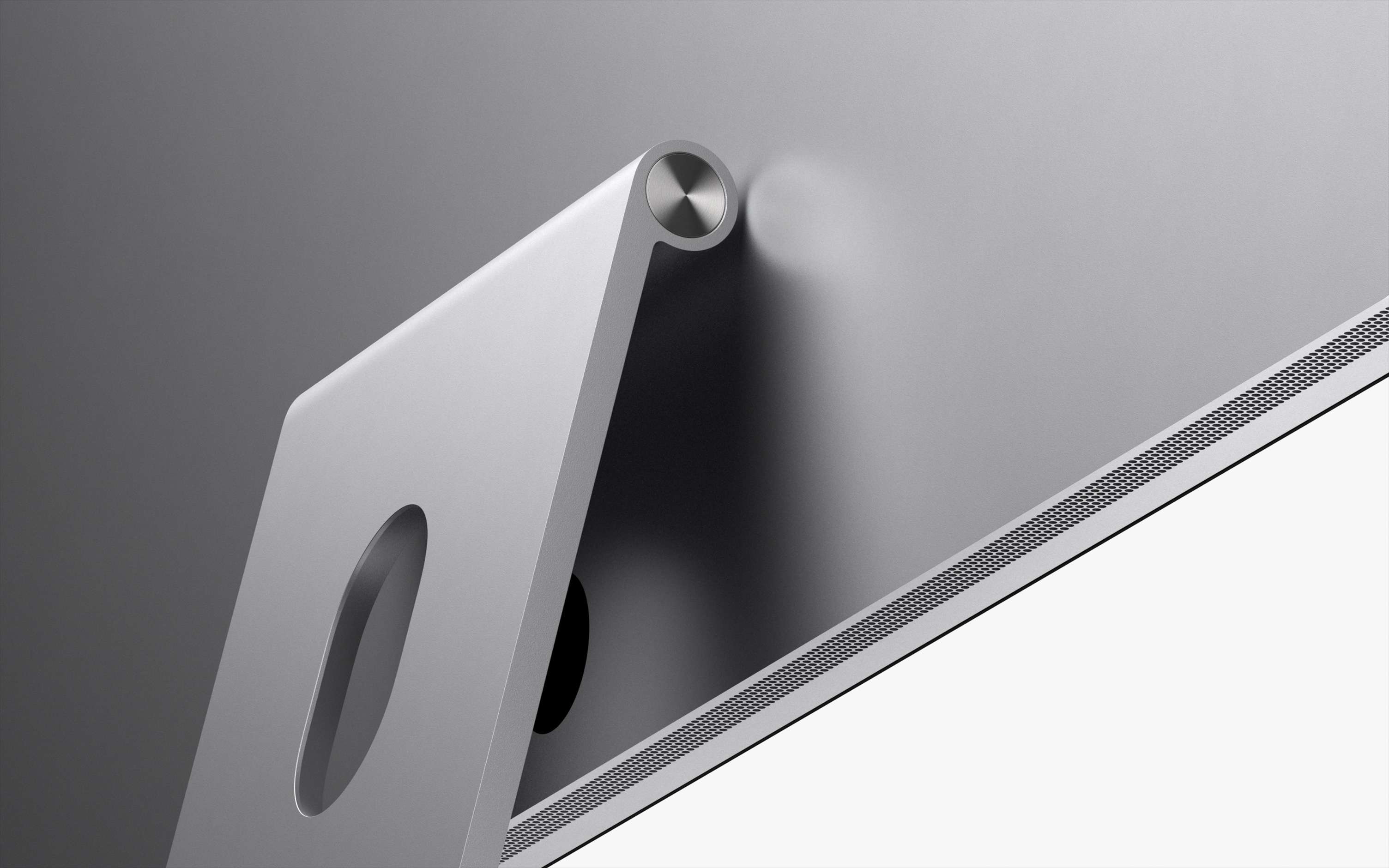 Studio Display mounted on the tilt-adjustable stand, shown from the rear